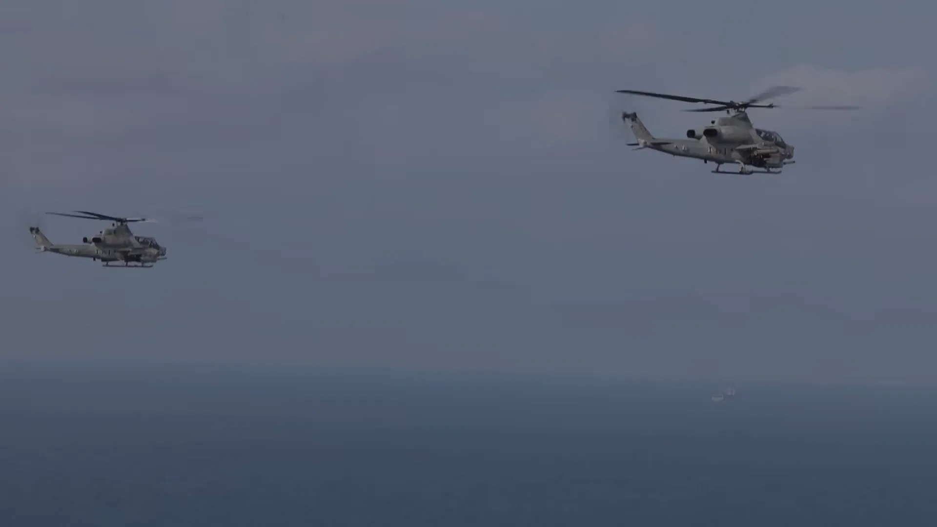 Frame at 7 s: two helicopters over the sea.