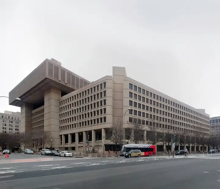 J. Edgar Hoover Building, the FBI headquarters on Pennsylvania Avenue in Washington, a concrete office block seen from the street.