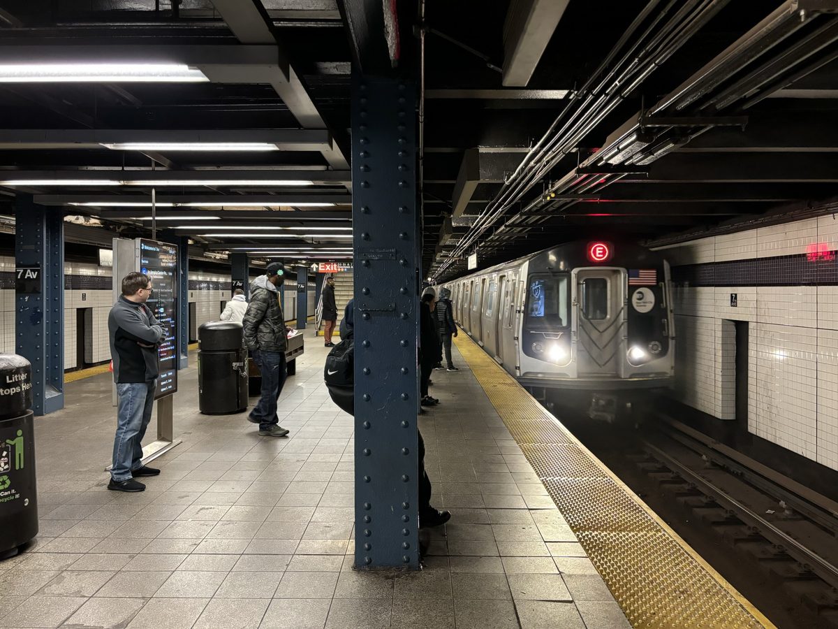 File, Nov 29, 2024: an E train at the 7th Av–53rd St northbound platform · not from this shooting